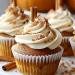 Indulge in Cream-Filled Pumpkin Cupcakes This Fall